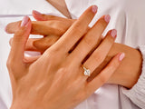 Diamond engagement ring on a woman's hand