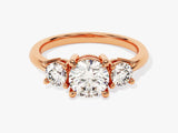 Rose gold three-stone diamond engagement ring