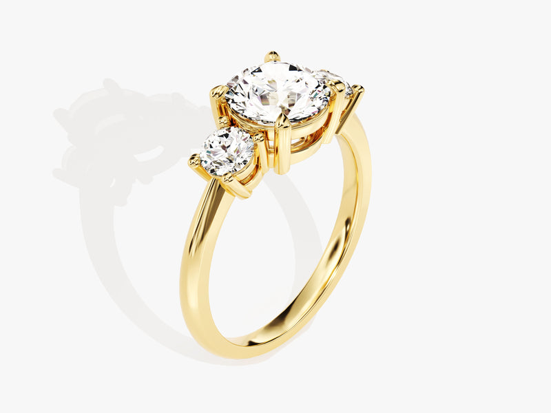 Gold three-stone diamond engagement ring for jewelry firm