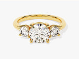 Gold three-stone diamond engagement ring from jewelry company