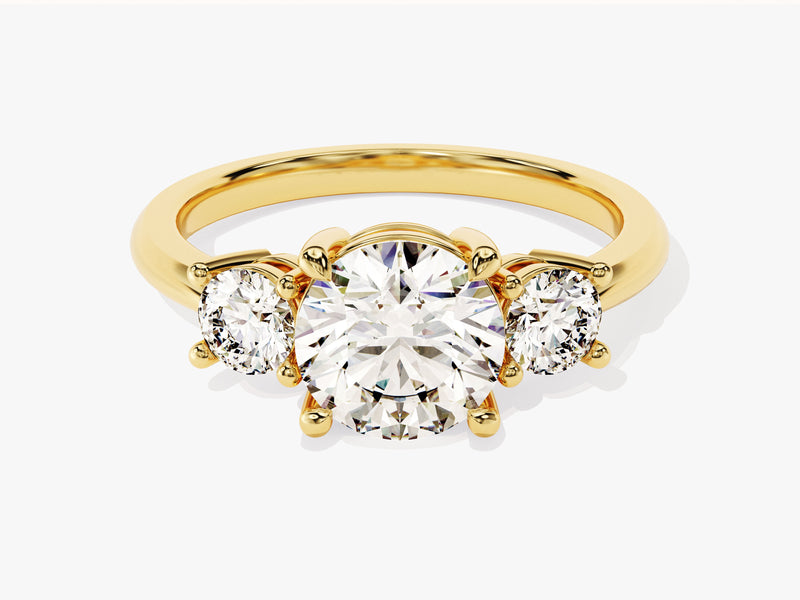 Gold three-stone diamond engagement ring from jewelry company