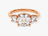 Rose gold three-stone diamond engagement ring
