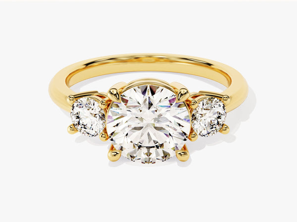 Gold three-stone diamond engagement ring
