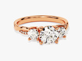 Rose gold three-stone diamond engagement ring