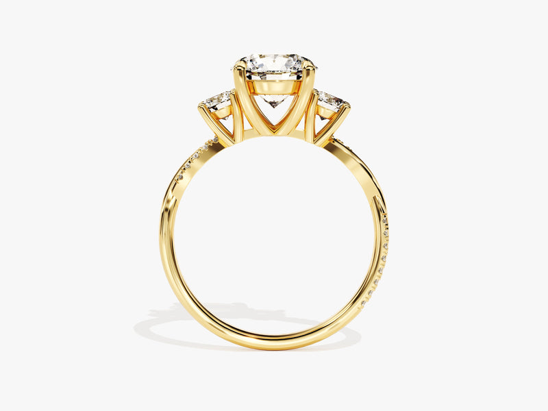 Gold three-stone diamond ring with pave band