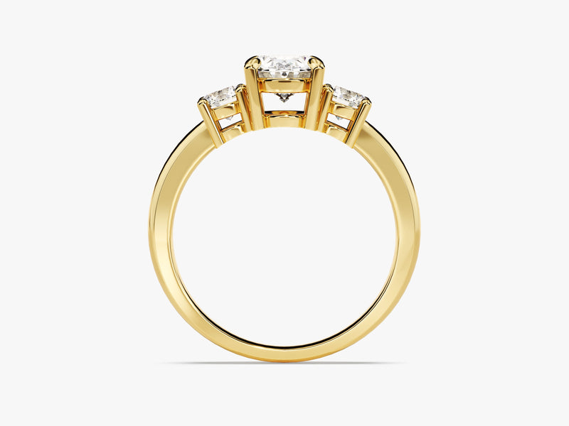 Three-stone diamond engagement ring in yellow gold