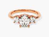 Rose gold three-stone diamond engagement ring
