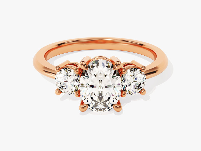 Rose gold three-stone diamond engagement ring