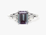 Emerald cut alexandrite ring with diamond accents