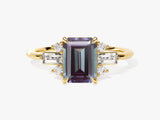 Emerald cut alexandrite ring with diamonds on gold band