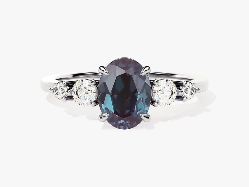 Oval alexandrite and diamond engagement ring