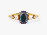 Oval alexandrite and diamond engagement ring in gold