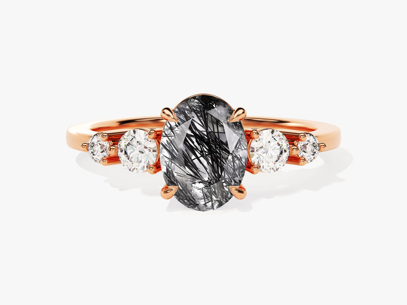 Rose gold ring with oval rutilated quartz and diamonds