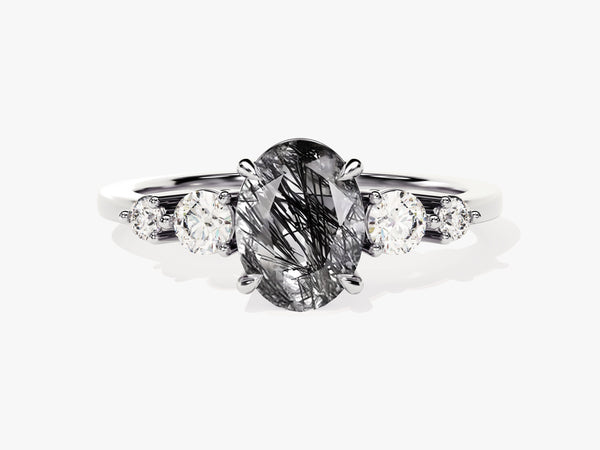 Oval rutilated quartz and diamond engagement ring