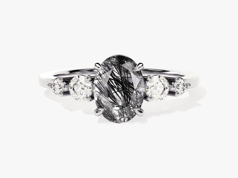 Oval rutilated quartz and diamond engagement ring
