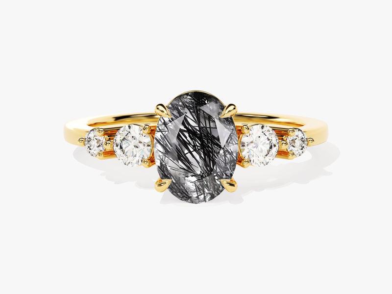 Gold ring with oval rutilated quartz and diamonds