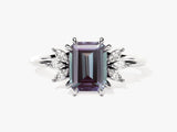 Emerald cut alexandrite ring with diamond accents