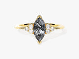 Gold ring with marquise rutilated quartz and diamonds
