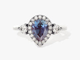 Pear-shaped alexandrite halo ring with diamonds