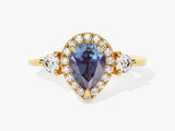 Gold pear-cut alexandrite halo ring with diamonds