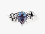 Pear-shaped alexandrite engagement ring with diamonds