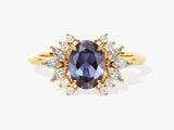 Oval alexandrite diamond halo ring in yellow gold