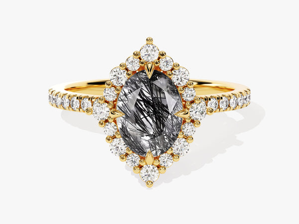 Gold ring with oval rutilated quartz and diamond halo