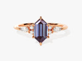 Hexagonal alexandrite ring with pear-shaped diamonds, rose gold setting