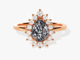 Rose gold ring with pear-cut rutilated quartz and diamond halo