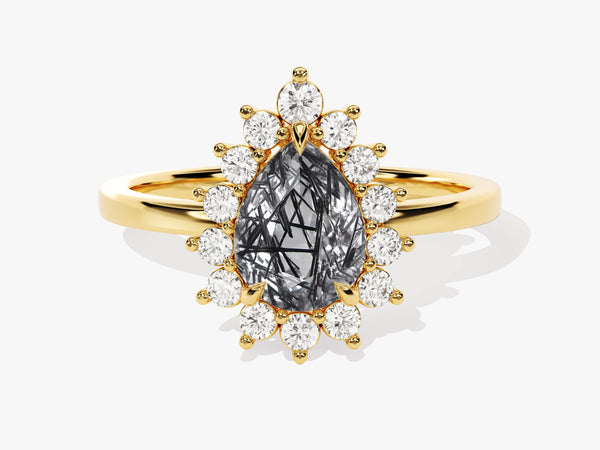 Gold ring with pear-cut rutilated quartz and diamond halo