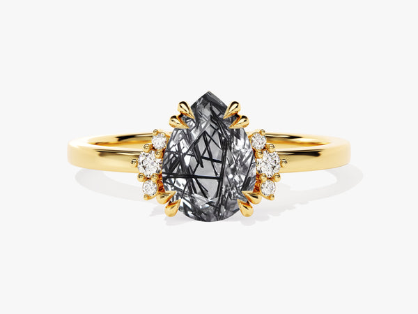 Gold ring with pear-cut rutilated quartz and diamond accents