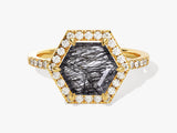 Hexagonal rutilated quartz ring with diamonds in yellow gold