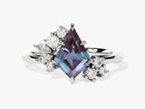 Diamond and alexandrite engagement ring by jewelry firm