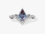 Diamond and alexandrite engagement ring with twisted band