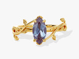 Marquise alexandrite ring with gold vine design