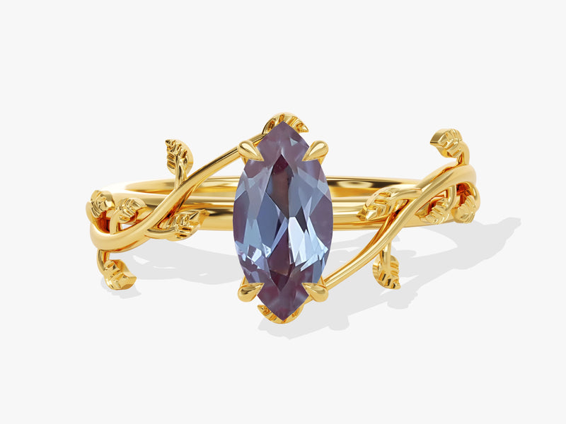 Marquise alexandrite ring with gold vine design