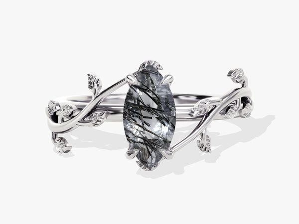 Marquise rutilated quartz ring with silver leaf band