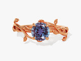Rose gold ring with alexandrite gemstone and leaf design