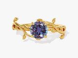 Gold alexandrite ring with vine leaf design