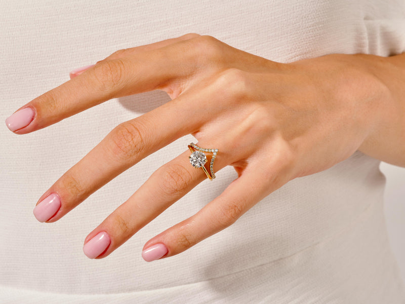 Diamond engagement ring on a woman's hand, jewelry