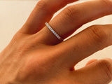 Diamond eternity band on finger, fine jewelry for women
