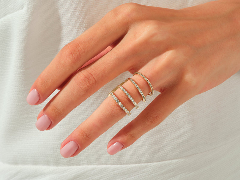 Diamond stacked rings on a hand, jewelry photography