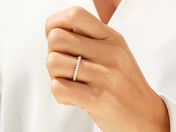 Diamond eternity band on hand, fine jewelry