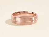 Rose gold brushed band ring with grooved detail, jewelry