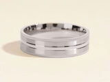 Men's brushed silver band ring with grooved edges and center inlay