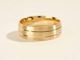 Gold ring with brushed finish and polished grooves jewelry
