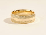 Gold textured ring for jewelry collection