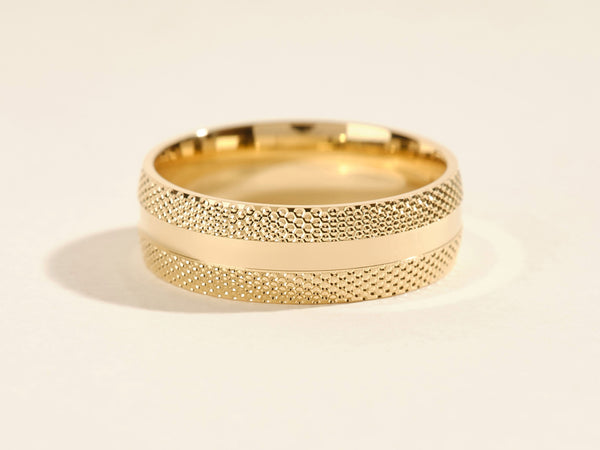 Gold textured ring for jewelry collection