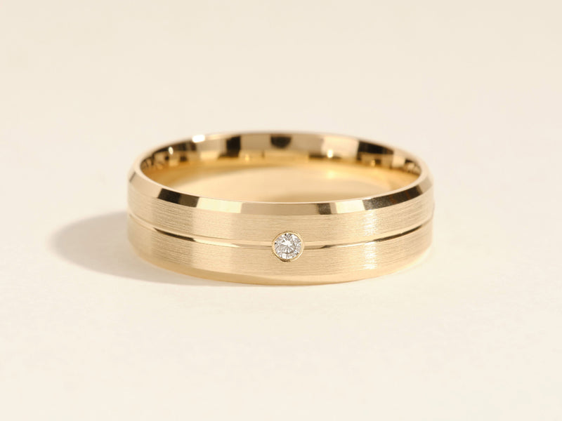 Gold wedding band with diamond accent, jewelry