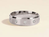 Diamond accented brushed platinum band ring for jewelry lovers